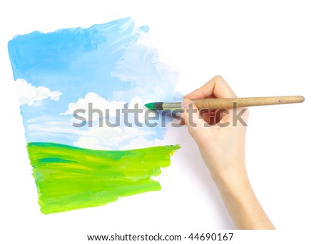 Hand with brush drawing a picture