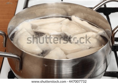 Boiling dumplings in water