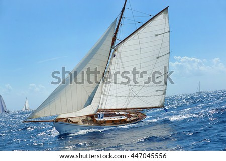 Yacht racing. Royalty-Free Stock Photo #447045556