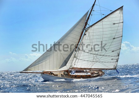 Yacht racing. Royalty-Free Stock Photo #447045565