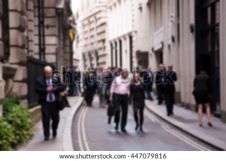 Blurred background of crowd of people in the city at rush hour