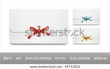 set of white envelopes with colored bows