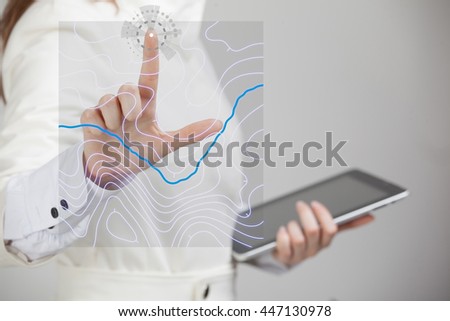 Geographic information systems concept, woman scientist working with futuristic GIS interface on a transparent screen. Royalty-Free Stock Photo #447130978