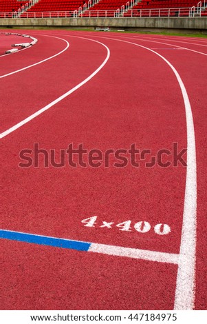 Red running track on the athletic stadium.
