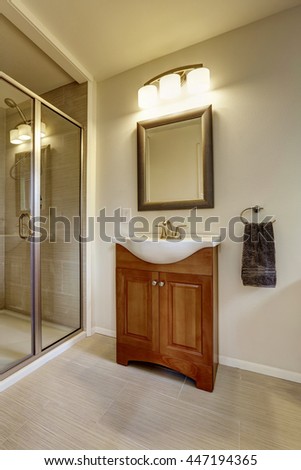 Beautiful grey new modern bathroom interior with white sink.