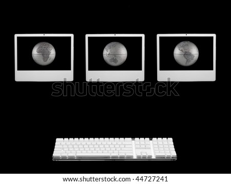 A desktop computer isolated against a black background