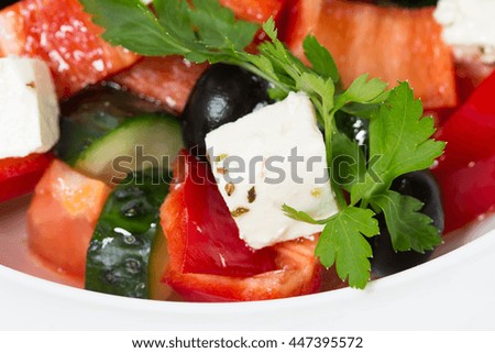 Delicious greek salad with olives and paprika. Macro. Photo can be used as a whole background.