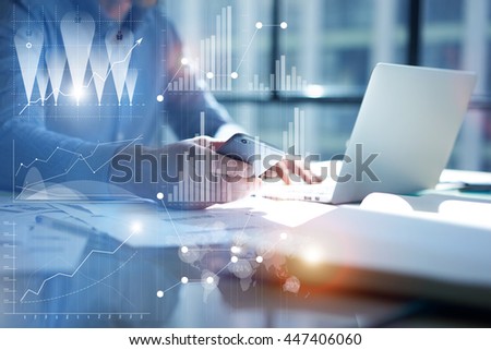 Man Typing Laptop,use Smartphone Hand.Project Manager Researching Process.Business Team Work Startup modern Office.Global Strategy Virtual Icon.Innovation Graphs Interface.Analyze market stock.Blurred Royalty-Free Stock Photo #447406060