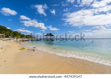 Mauritius beach thatch jetty. Tropical Mauritius island water & beach resort, Turtle Bay - Balaclava