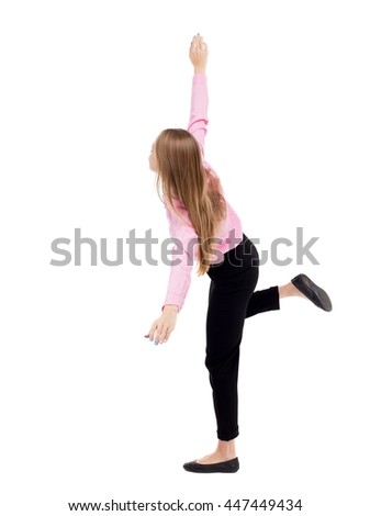 Balancing young business woman. dodge falling woman. Rear view people collection.  backside view of person. Isolated over white background. girl office worker in black trousers jumping on right foot