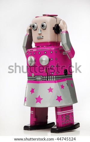 pink tin wind up toy