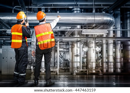 Govern engineer of the powerhouse pipe system Royalty-Free Stock Photo #447463159
