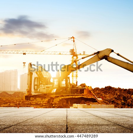 Construction sites, working in the excavator. Royalty-Free Stock Photo #447489289