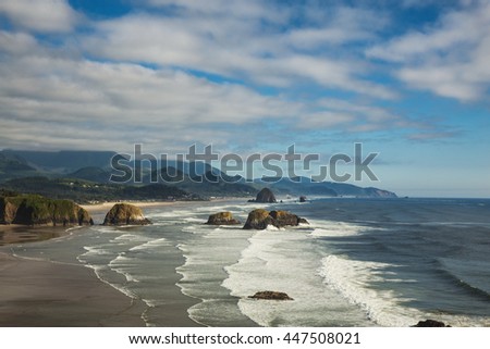 Canon Beach on the Oregon Coast, USA. Picture taken from Ecola Point on a cloudy evening.