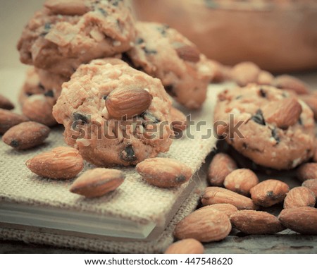 Homemade Almond cookies on a shabby wooden table background - Vintage effect style pictures.