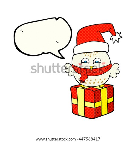 freehand drawn comic book speech bubble cartoon cute christmas owl on wrapped present