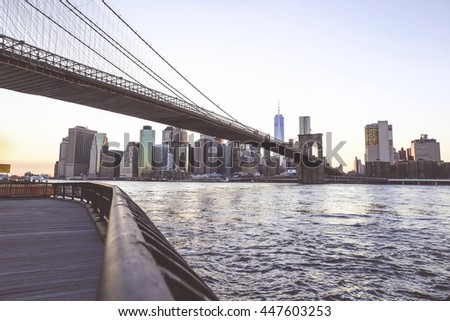 Brooklyn Bridge and Manhattan skyline at sunset, NYC