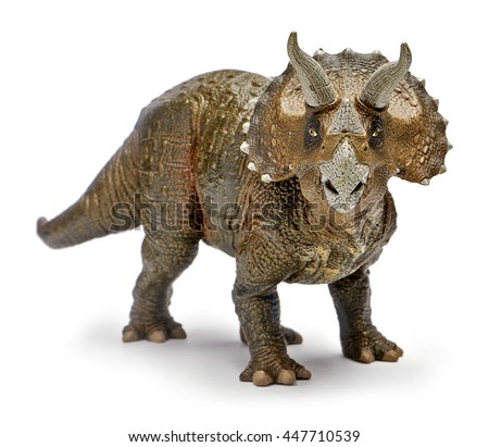 Triceratops dinosaurs toy isolated on white background with clipping path. Royalty-Free Stock Photo #447710539