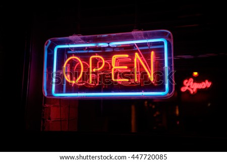 neon open sign at a storefront