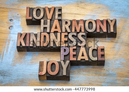 love, harmony, kindness, peace and joy - inspirational word abstract in vintage letterpress wood type