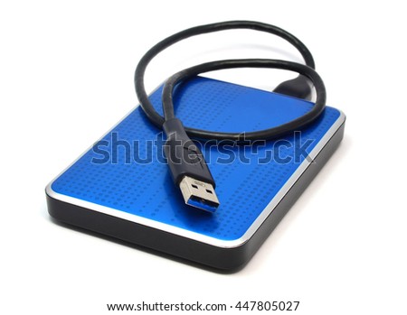 Blue external hard drive for data storage and security - isolated on white background Royalty-Free Stock Photo #447805027