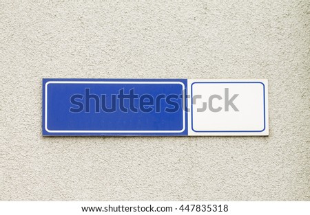 Blue modern styled house nameplate empty white space for number and text with street name on the concrete wall background
