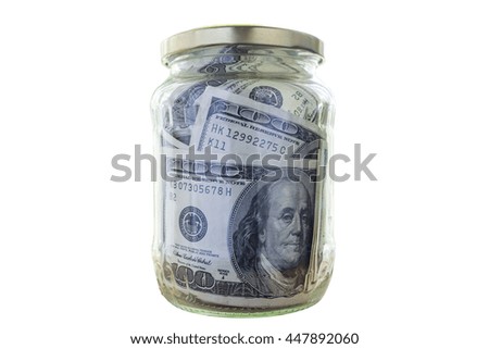 Money in the jar isolated on white background