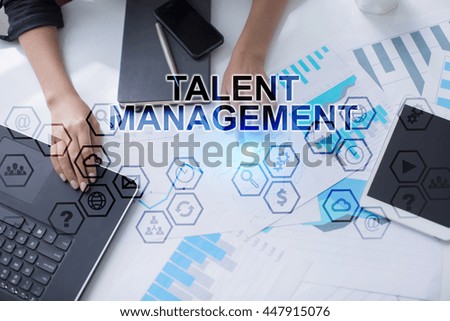 Womans hands working with documents, Tablet pc and notebook. Talent management Concept. 