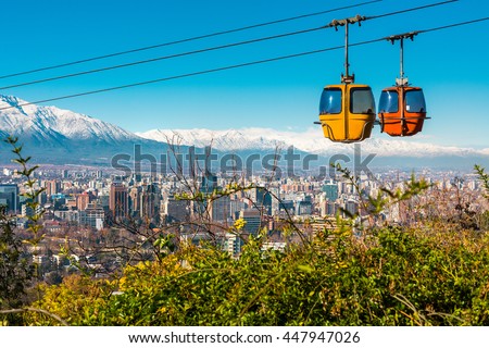Cable car in San Cristobal hill, overlooking a panoramic view of Santiago de Chile   Royalty-Free Stock Photo #447947026