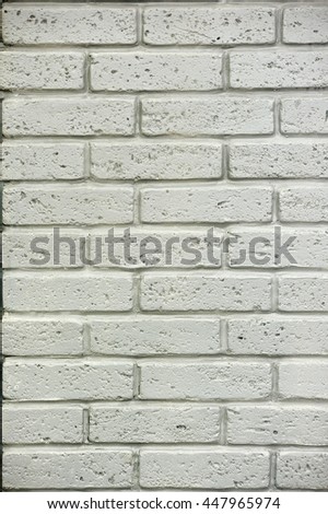 Decorating the walls of a beautiful decorative bricks , plaster , pattern , texture , the background