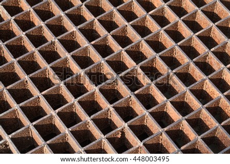steel grating image taken low to the ground for a long diminished perspective