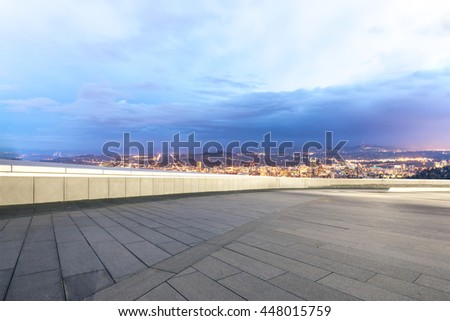 cityscape and skyline of portland in cloud sky at twilight on view from empty floor