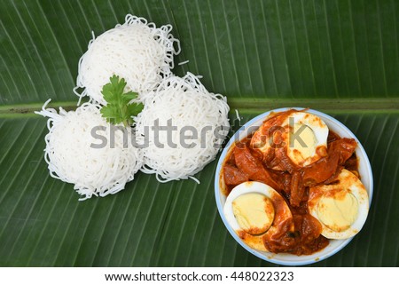 Idiyappam, or Nooputt, Putumayam or string hoppers is a traditional Tamil, Kerala, Kodava, Tulu and Sri Lankan food consisting of rice flour pressed into noodle steamed hot and spicy egg roast curry