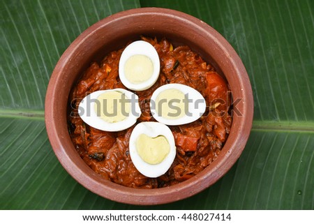 Egg roast curry,  Alappuzha, India. A popular traditional Kerala cuisine, is an ideal side dish  to be served with appam/ plain hoppers, chapati, roti, parattas and  rice. South Indian food.