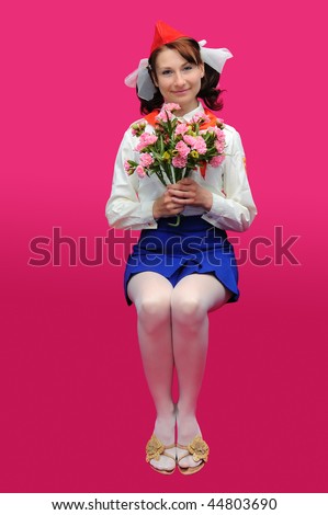The pioneer with flower  on a pink background. The form of soviet time