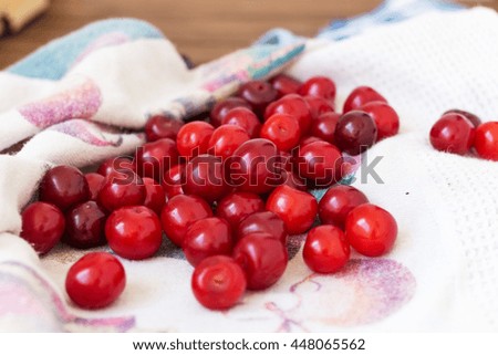Fresh cherries on a linen napkin