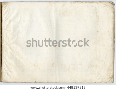 Isolated real old paper sheet with worn out corners