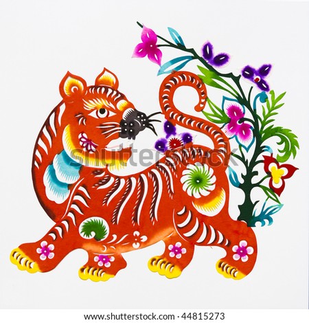 tiger,This is a picture of Chinese paper cutting, representing the Chinese Zodiac, such as mouse, ox, and tiger. Paper-cutting is one of the traditional Chinese arts and crafts.