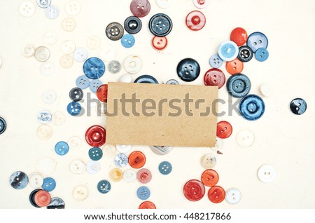 Various buttons composition, wooden background, vintage paper background, mock up