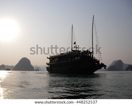H? Long Bay. Vietnam.  photo backlit.  boat.
