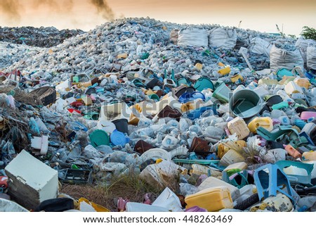Plastic waste dumping site Royalty-Free Stock Photo #448263469