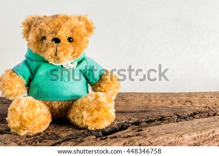Teddy bear toy on a wooden floor