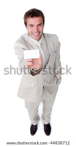 Assertive caucasian businessman holding a white card against a white background
