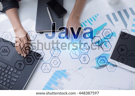Woman working with documets and laptop in office. Java,