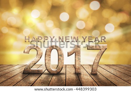 Happy New Year 2017 text wood on modern wooden floor with bokeh and light star.