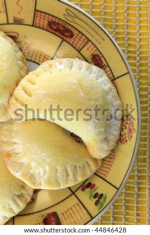 home made biscuit filled with marmalade isolated on white