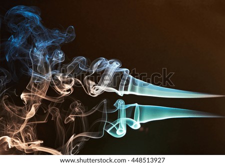 smoke curves colourful on brown background