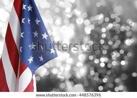 USA flag in front of blurry circles