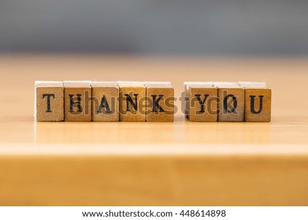 Thank you. word written on wood block