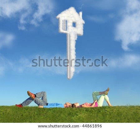 lying couple on grass and dream house key collage